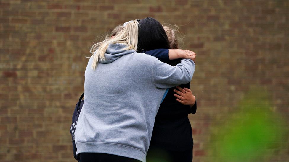 School pupils embracing