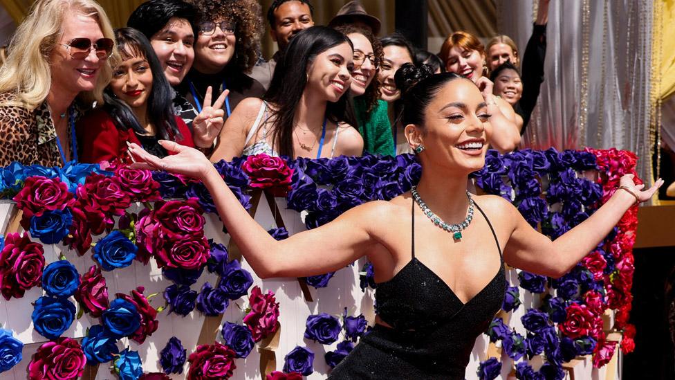 Vanessa Hudgens poses on the red carpet during the Oscars arrivals at the 94th Academy Awards in Hollywood