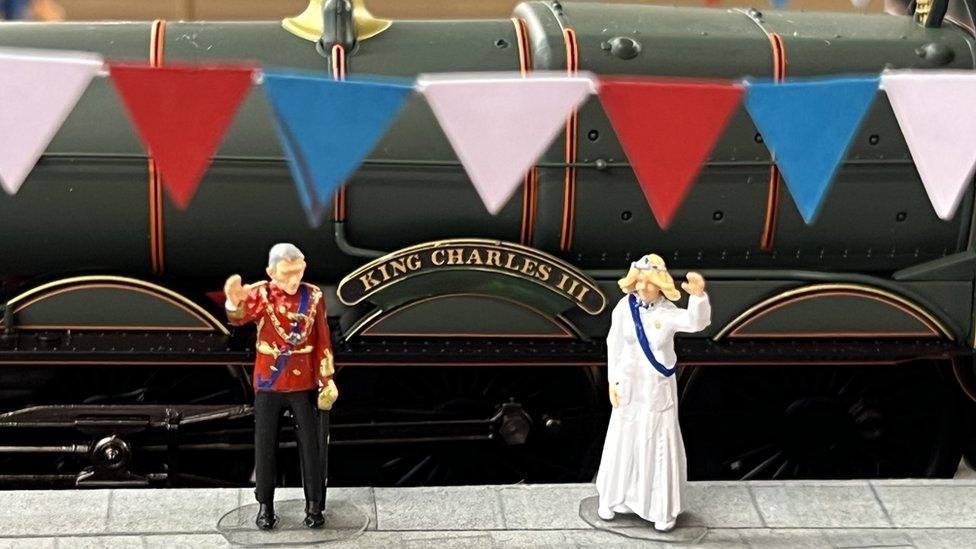 King Charles III and Queen Consort Camilla in model