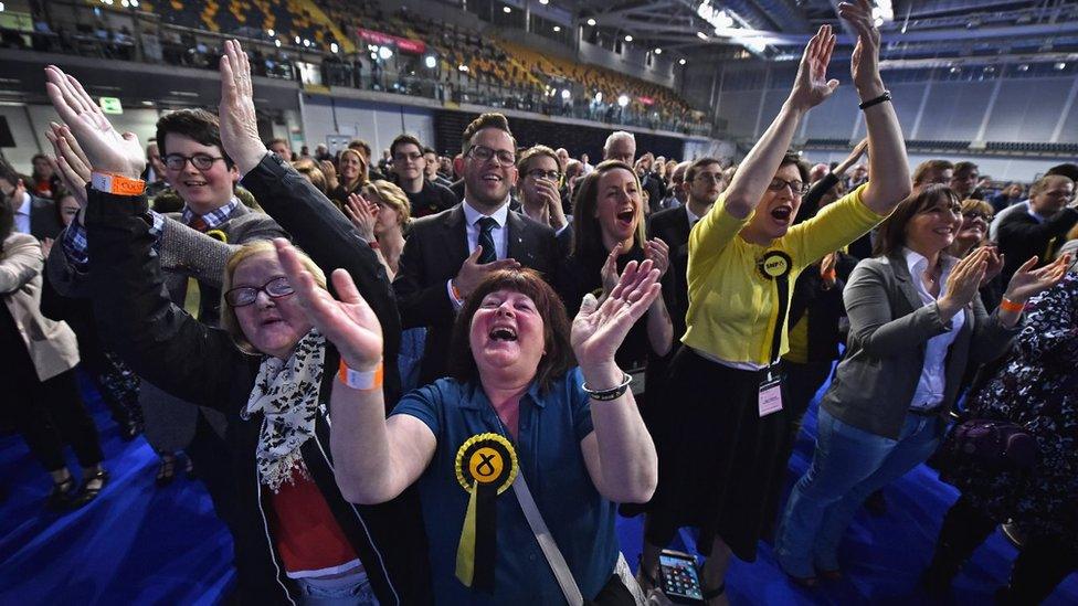 SNP supporters celebrate in Glasgow