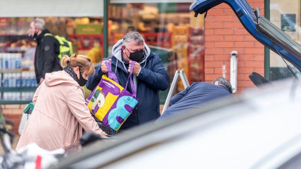 Christmas shoppers outside a Morissons store