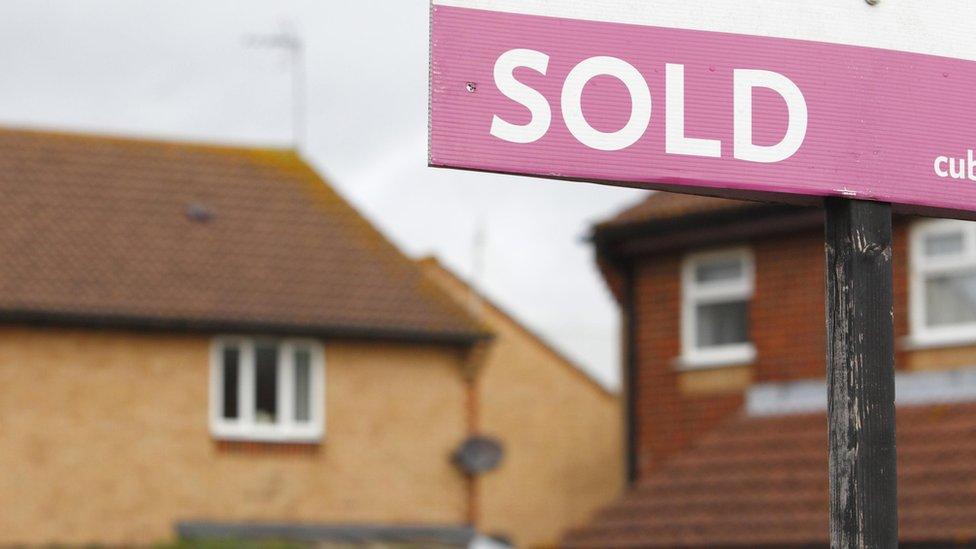 House sold sign