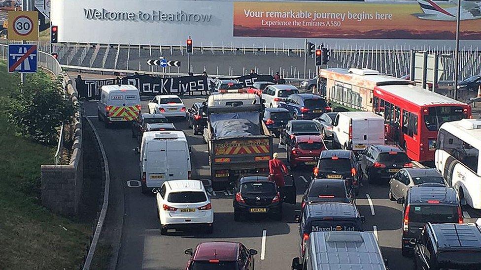 Black Lives Matter protesters lying on the road which has brought traffic heading to Heathrow airport to a standstill