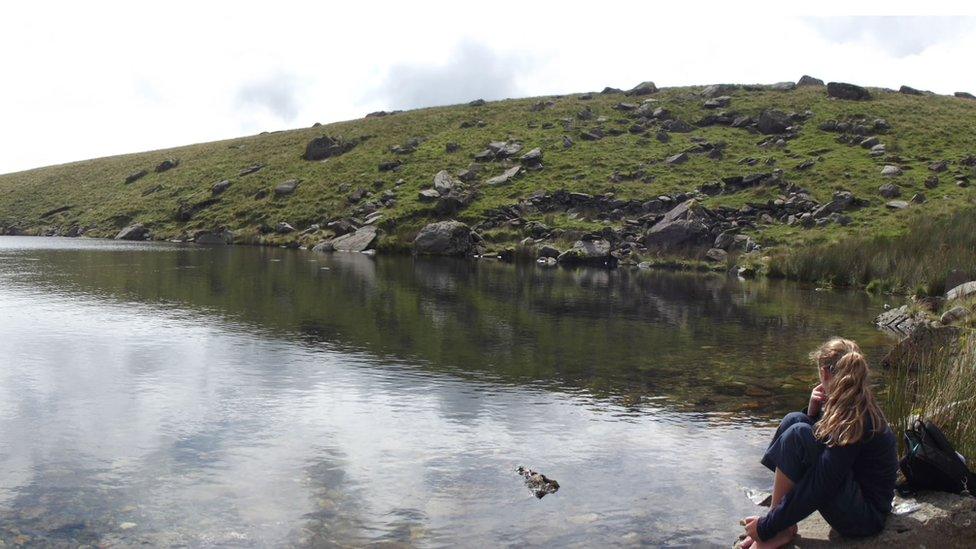 Stephen Bulpitt's daughter on the bank of Llyn-Ffynnon-y-gwas coming down the Snowdon Ranger path