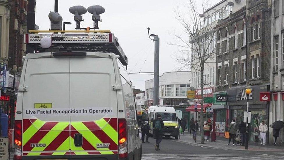 A van with an LFR camera and fluorescent signage in Croydon