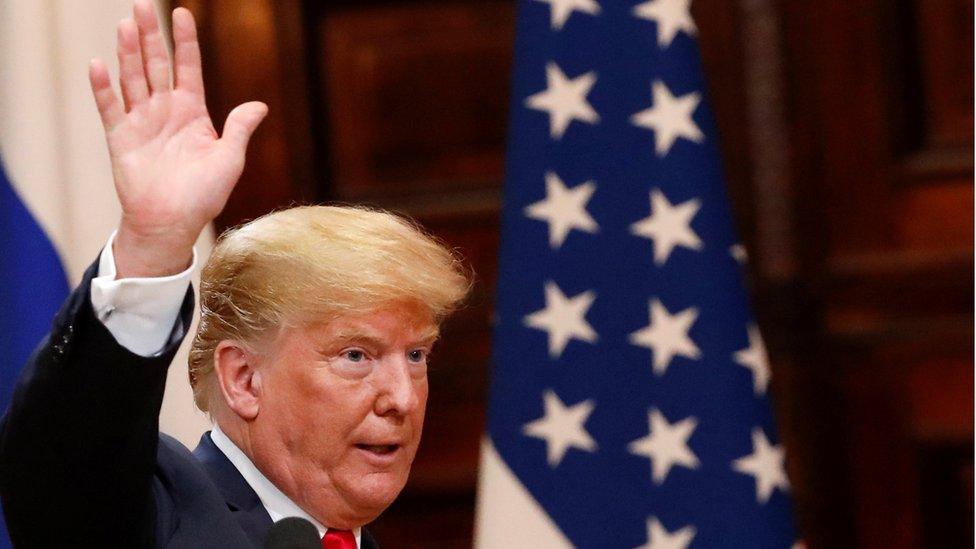 U.S. President Donald Trump waves after a joint news conference with Russian President Vladimir Putin (not pictured) in Helsinki, Finland July 16, 2018