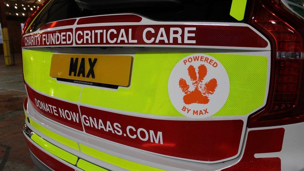 Rear view of the new rapid response vehicle with a sticker of Max's pawprint on the boot