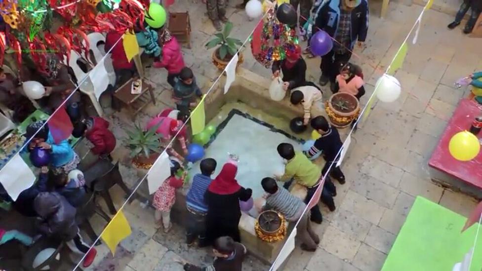 Abu Ahmed hosted a party for local children during the war