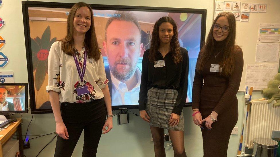 Dr Ali Struthers with students at the University of Warwick