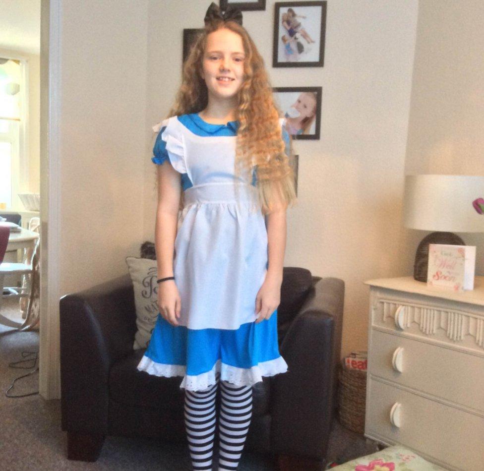 Poppy from West Sussex in England is Alice from Lewis Carroll's Alice in Wonderland