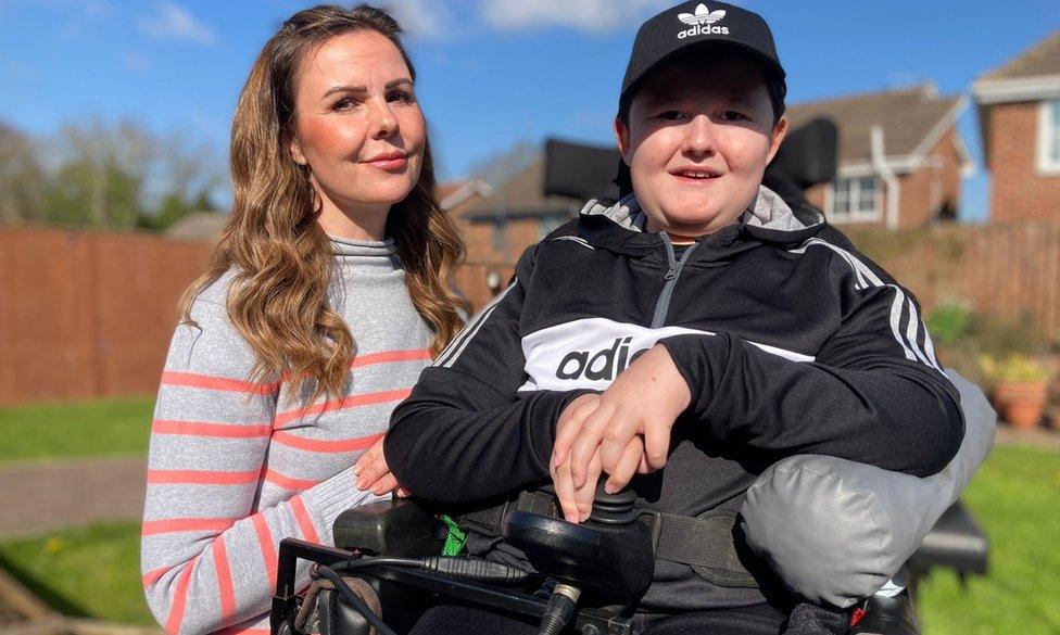 Charlie and his mum Helen at home