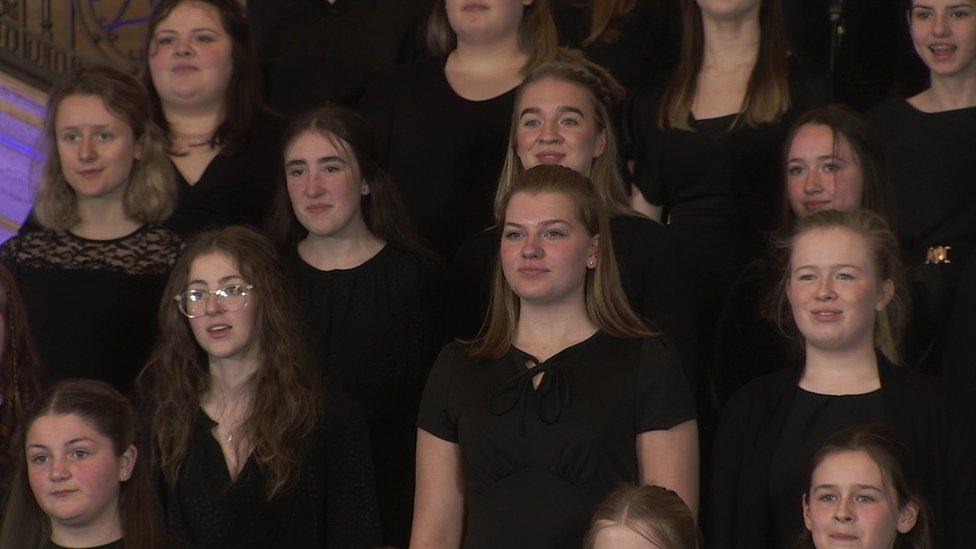 Singers from the Belfast School of Performing Arts perform at Parliament Buildings at Stormont