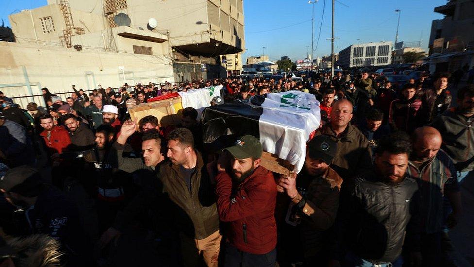 Crowds attend funeral ceremonies of those who lost their lives during twin suicide bombing attack at al-Tayaran Square in Baghdad, Iraq on January 21, 2021