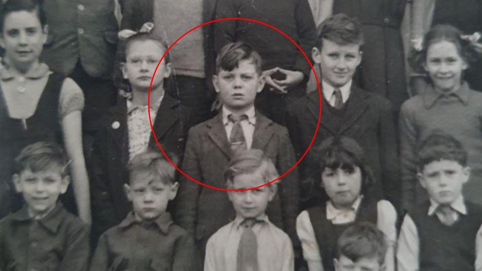 Ernie Puffett, from Chichester, West Sussex, at school as a child