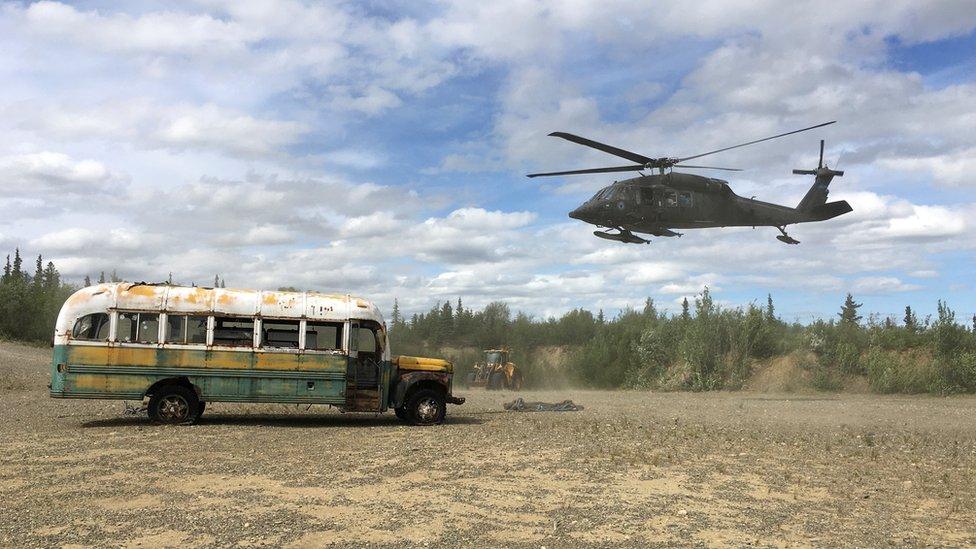 bus having been lifted to the east side of the teklanika river