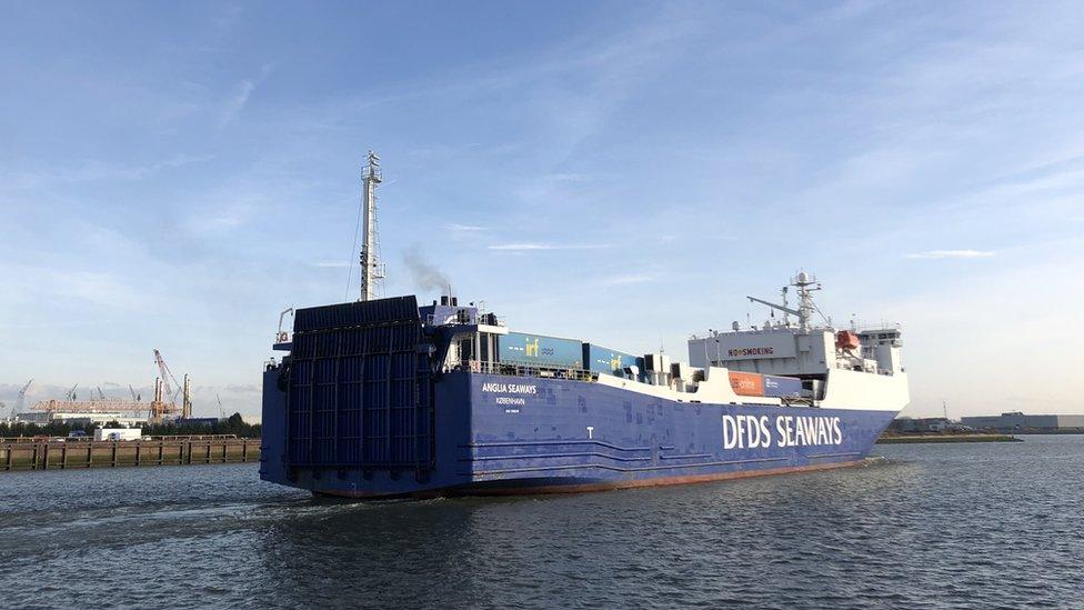 A container ship departs the port of Vlaardingen, bound for the UK