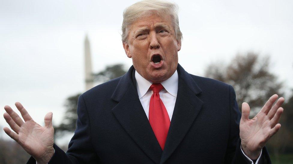 U.S. President Donald Trump answers questions from the press while departing the White House on November 26, 2018 in Washington, DC.