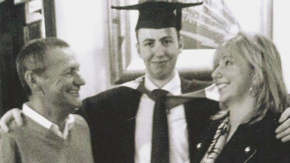 Mr Murphy with son and lady at graduation