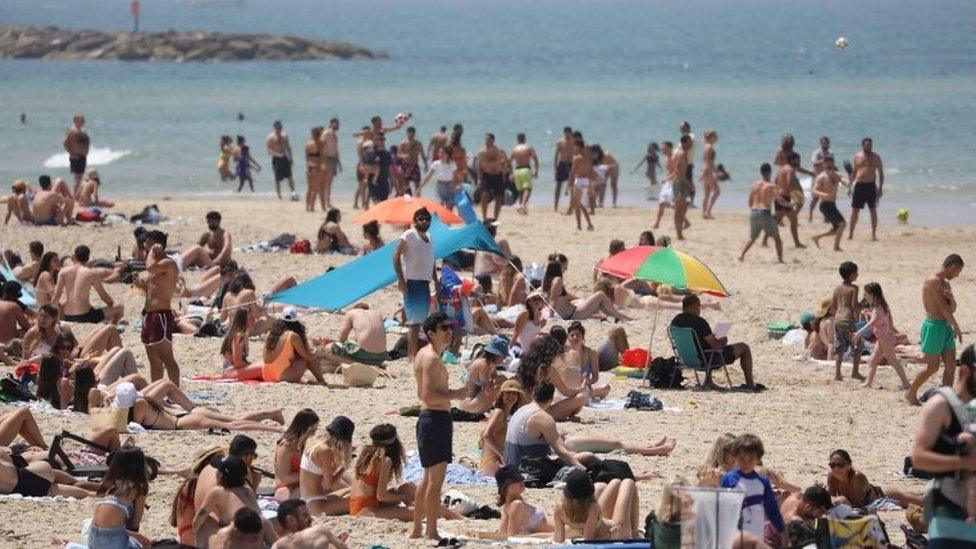 people on Tel Aviv beach