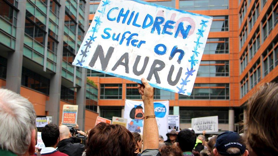 Protesters outside the offices of the Australian immigration department in Sydney, 4 February