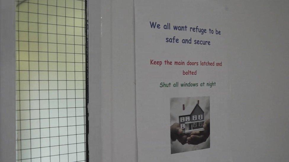 Poster in refuge that says 'we want refuge to be safe and secure'