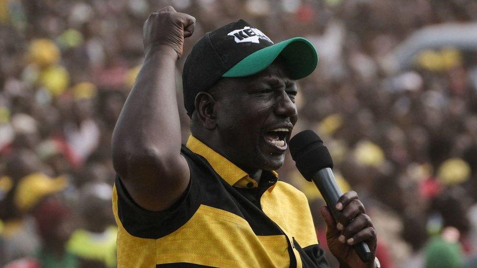 Kenya's Deputy President William Ruto speaks on a stage during his first rally after being officially nominated as a Presidential candidate