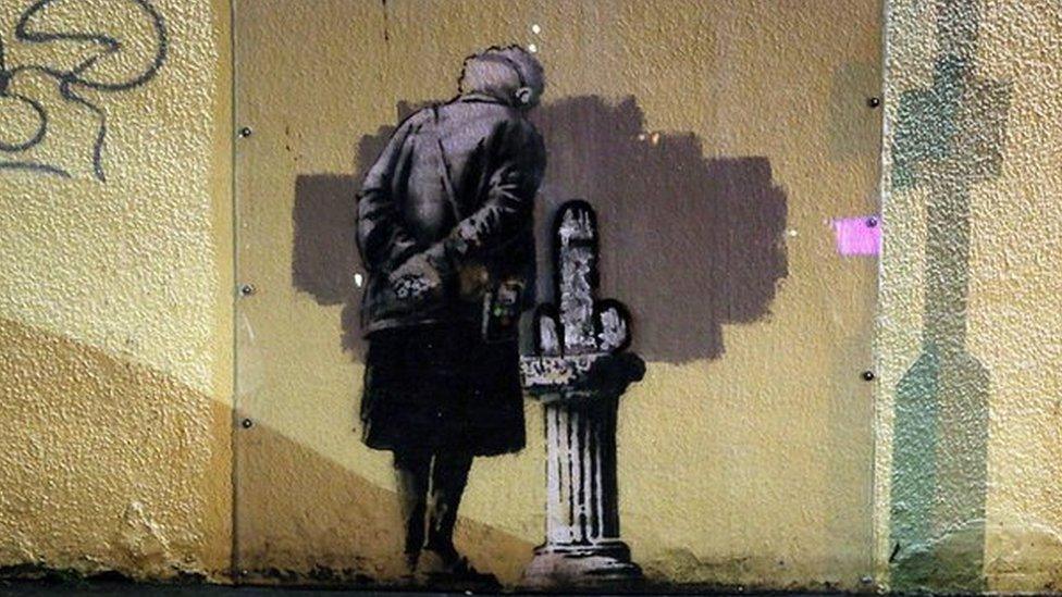 Vandalised Banksy image