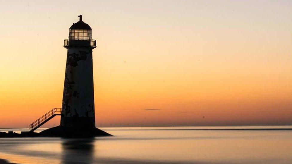 This picture of Flintshire's Talacre lighthouse brooding against a colourful sunset was taken by Mark Young.