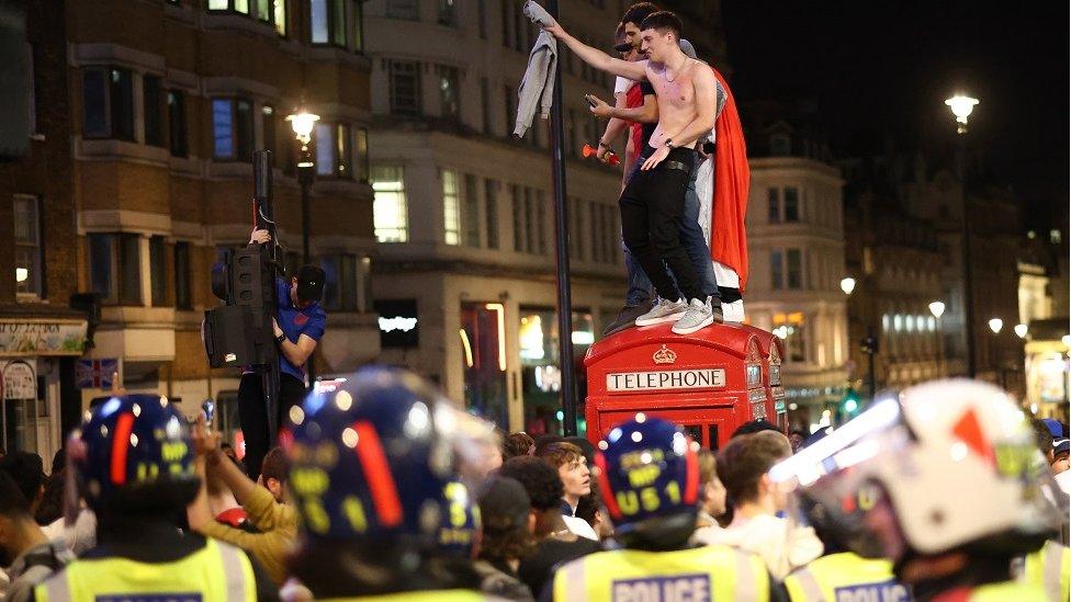 Fans gather for England v Denmark - Piccadilly Circus, London, Britain