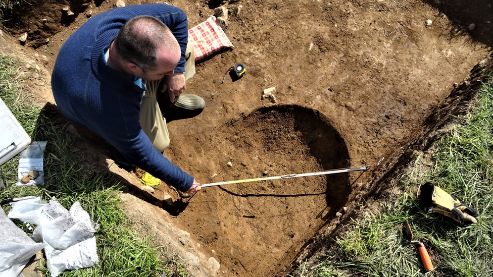 A man in an excavation