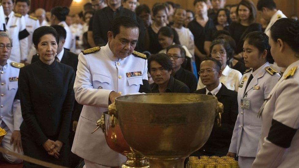 Thai Prime Minister Prayuth Chan-ocha attends a bathing ceremony for the former Thai king