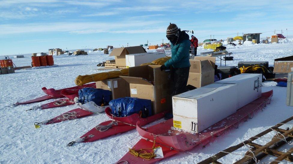 Packing boxes onto sleds