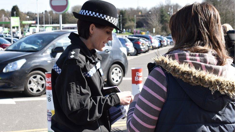 Police handing out flyers