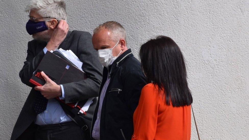 Simon Silwood (centre) arriving at Dudley Magistrates's Court