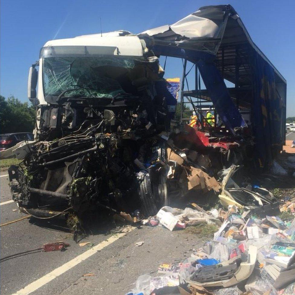 One of the crashed lorries