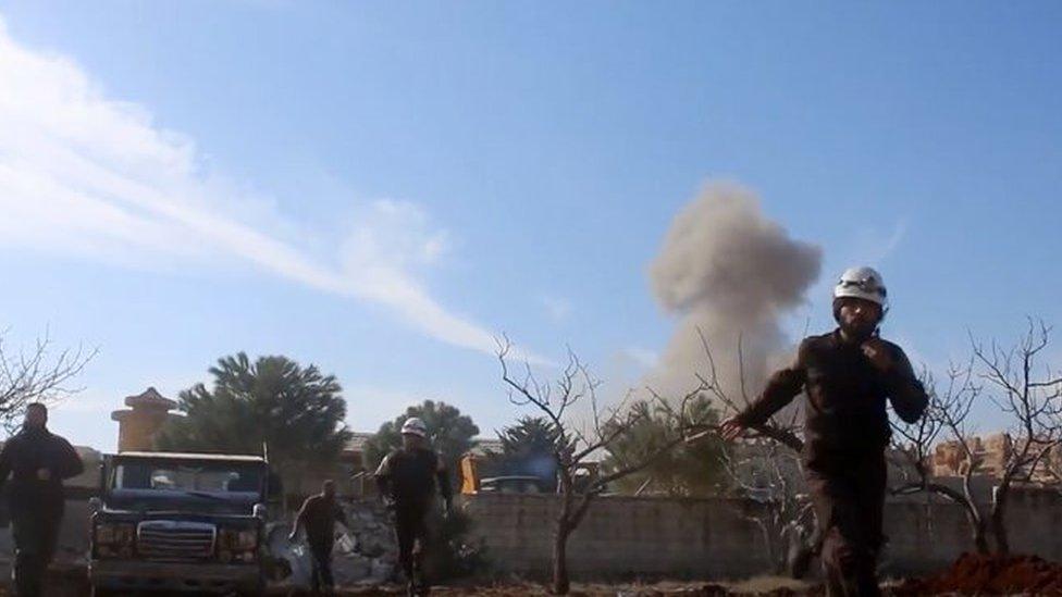 Syrian Civil Defence rescuers running from the site of a second explosion near the hospital run by MSF (15 February 2016)