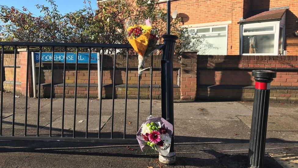 Flowers left at scene in Randlesdown Road in Bellingham, south-east London