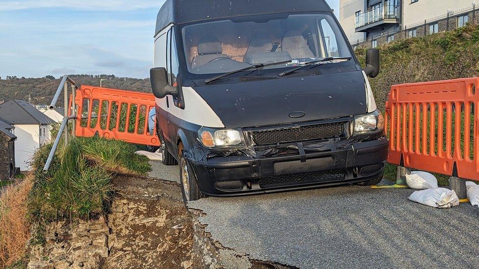 Van on edge of landslip