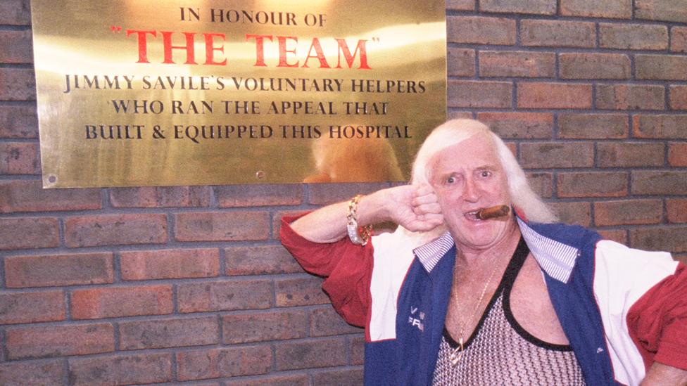 Savile in 2003 outside Stoke Mandeville Hospital