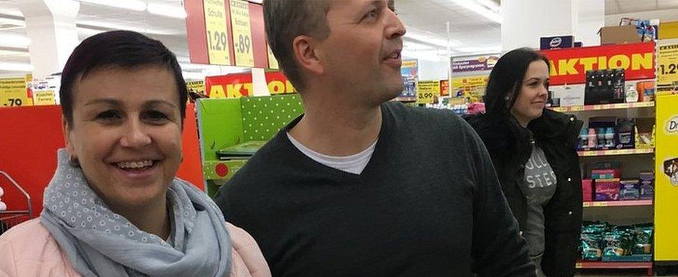 Czech shoppers Petr and Sarka in a supermarket in Altenberg, Germany