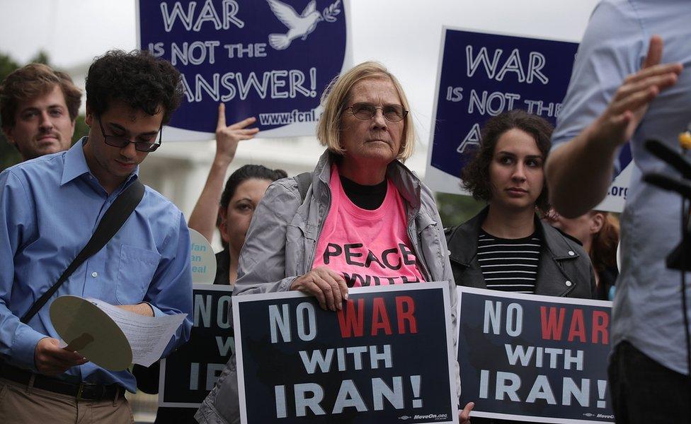 Activists protest in front of the White House October 12, 2017