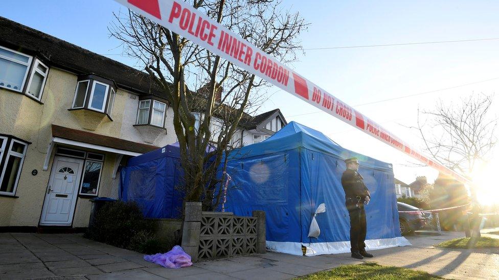 A police officer stands on duty outside the home of Nikolai Glushkov in New Malden, on the outskirts of London, Britain, March 16, 2018