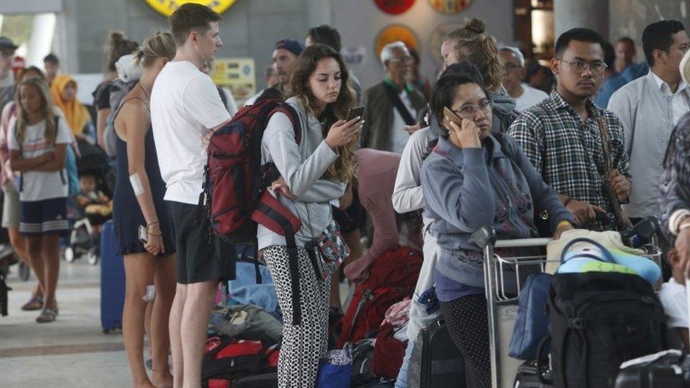 People waiting to check in at Praya International airport in Lombok