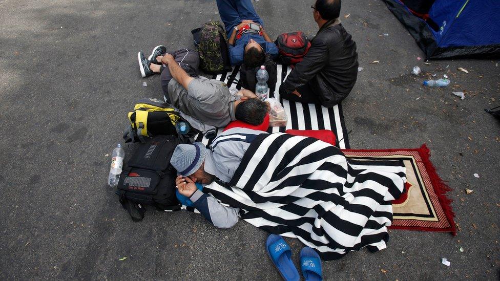 Migrants at the Horgos border crossing into Hungary in Serbia.