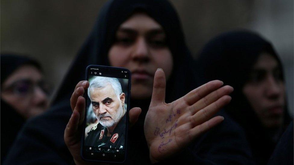 A woman demonstrates over the killing of top Iranian military commander, General Qasem Soleimani, 3 January 2020