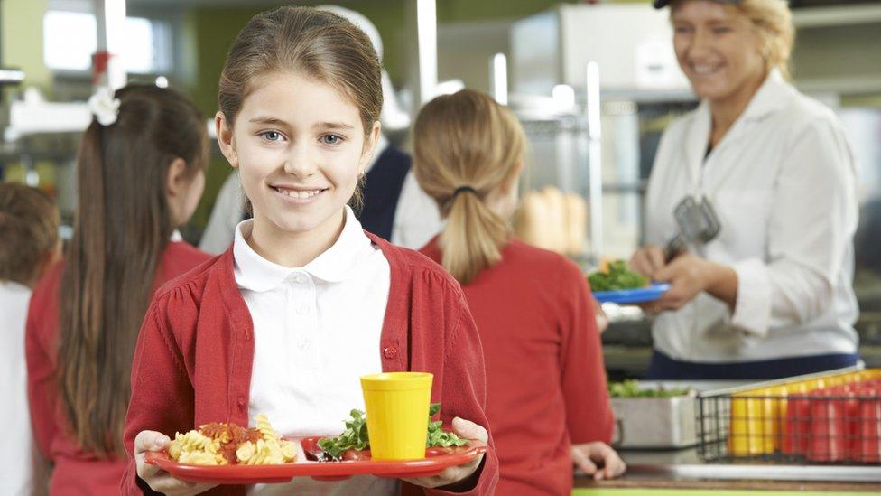 schoolgirl with tray