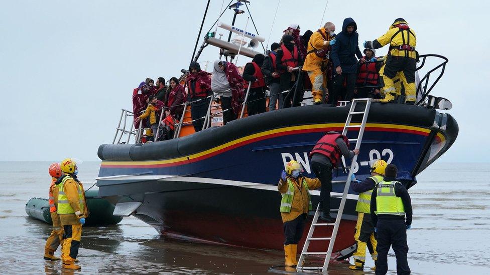 A group of people thought to be migrants are brought in to Dungeness, Kent, by the RNLI following a small boat incident in the Channel