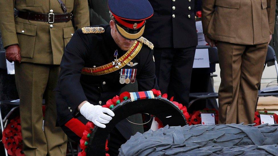 Prince Harry attending the remembrance service at the National Memorial Arboretum.