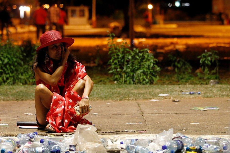 A Rousseff supporter weeps in Brasilia, 18 April