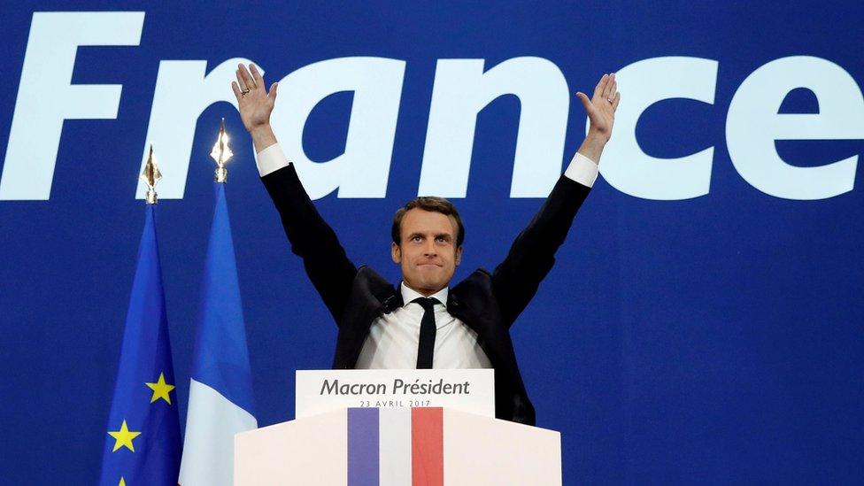 Emmanuel Macron, head of the political movement En Marche !, or Onwards !, and candidate for the 2017 French presidential election, celebrates after partial results in the first round of 2017 French presidential election, at the Parc des Expositions hall in Paris, France April 23, 2017